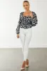 Black Polka Dot Smocked Puff Sleeve Bodysuit sold by Lime Lush
