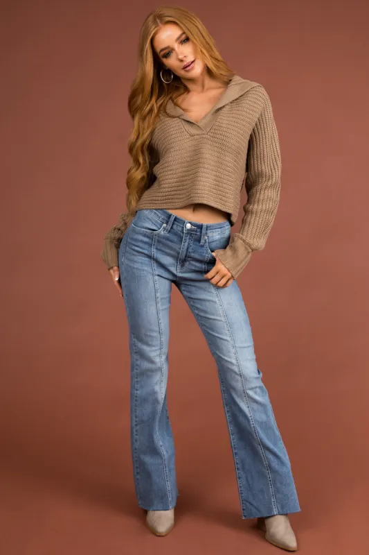 Sneak Peek Light Wash High Rise Flare Leg Raw Hem Jeans sold by Lime Lush