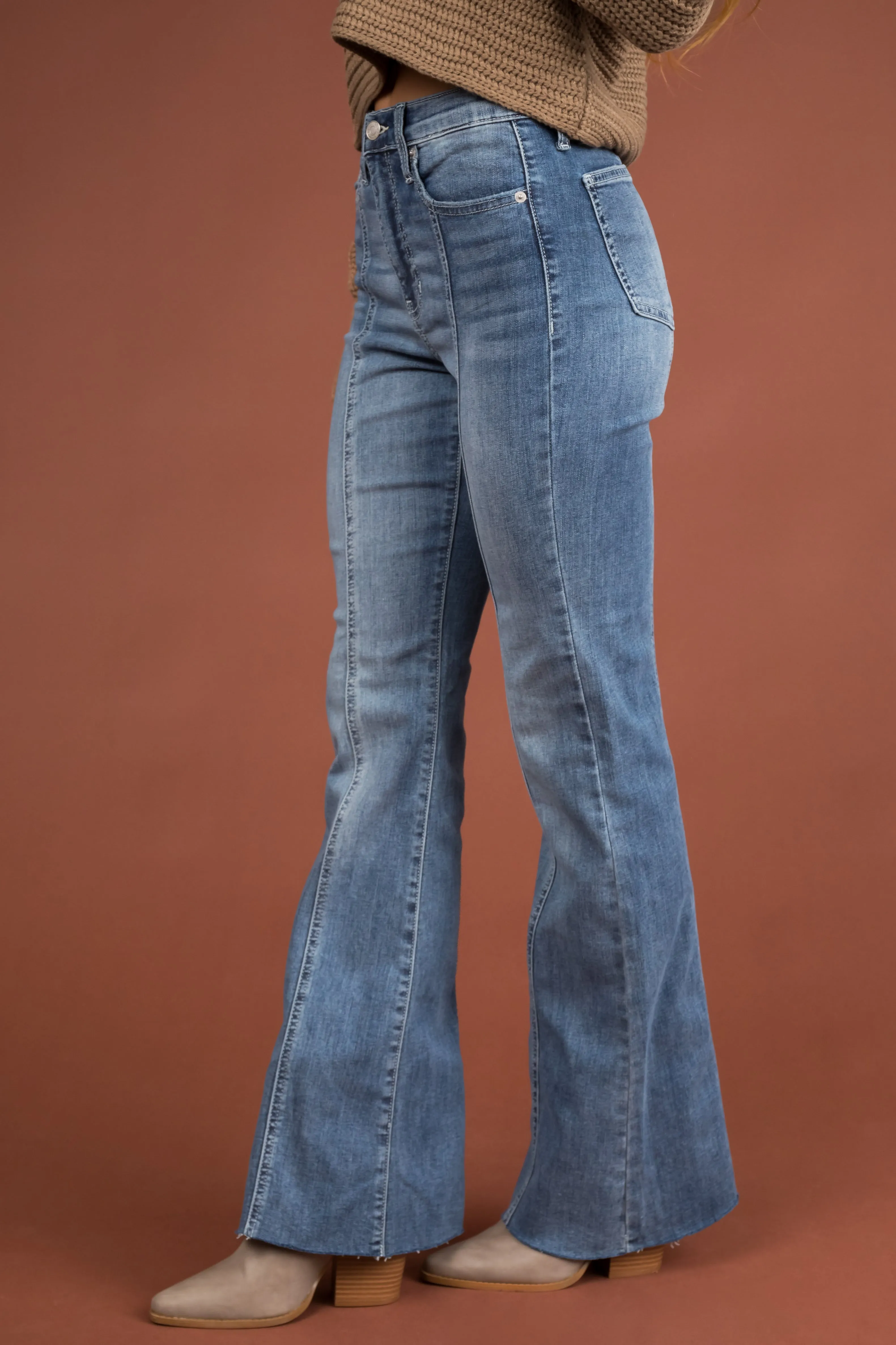 Sneak Peek Light Wash High Rise Flare Leg Raw Hem Jeans sold by Lime Lush product image thumbnail 4