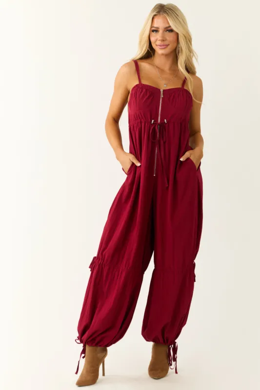 Maroon Sleeveless Zip Up Drawstring Jumpsuit sold by Lime Lush