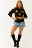 Black Jack-O-Lantern Graphic Soft Knit Sweater sold by Lime Lush