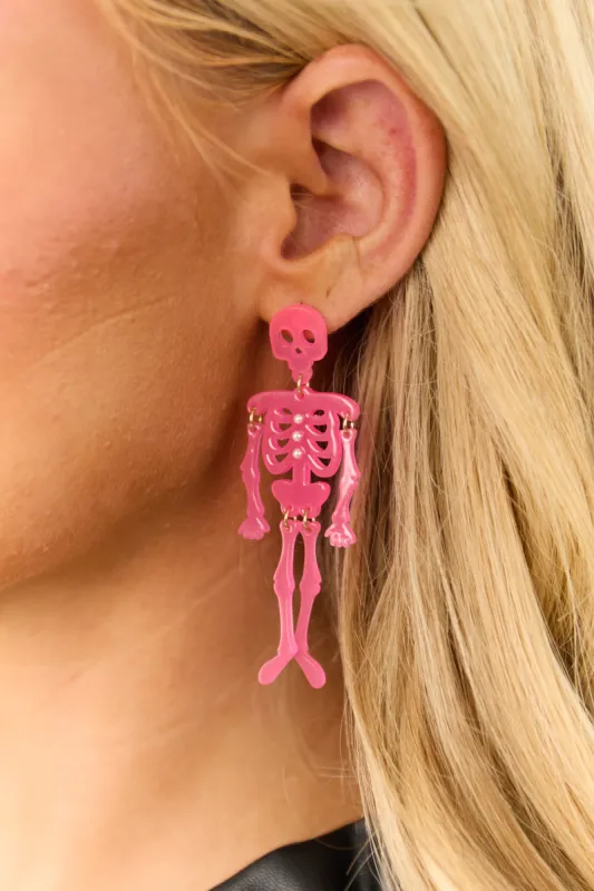 Hot Pink Glow in the Dark Skeleton Dangle Earrings sold by Lime Lush