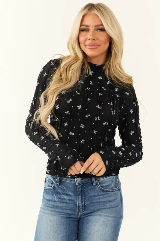 Black Bow Print Lace Ruffle Long Sleeve Top sold by Lime Lush