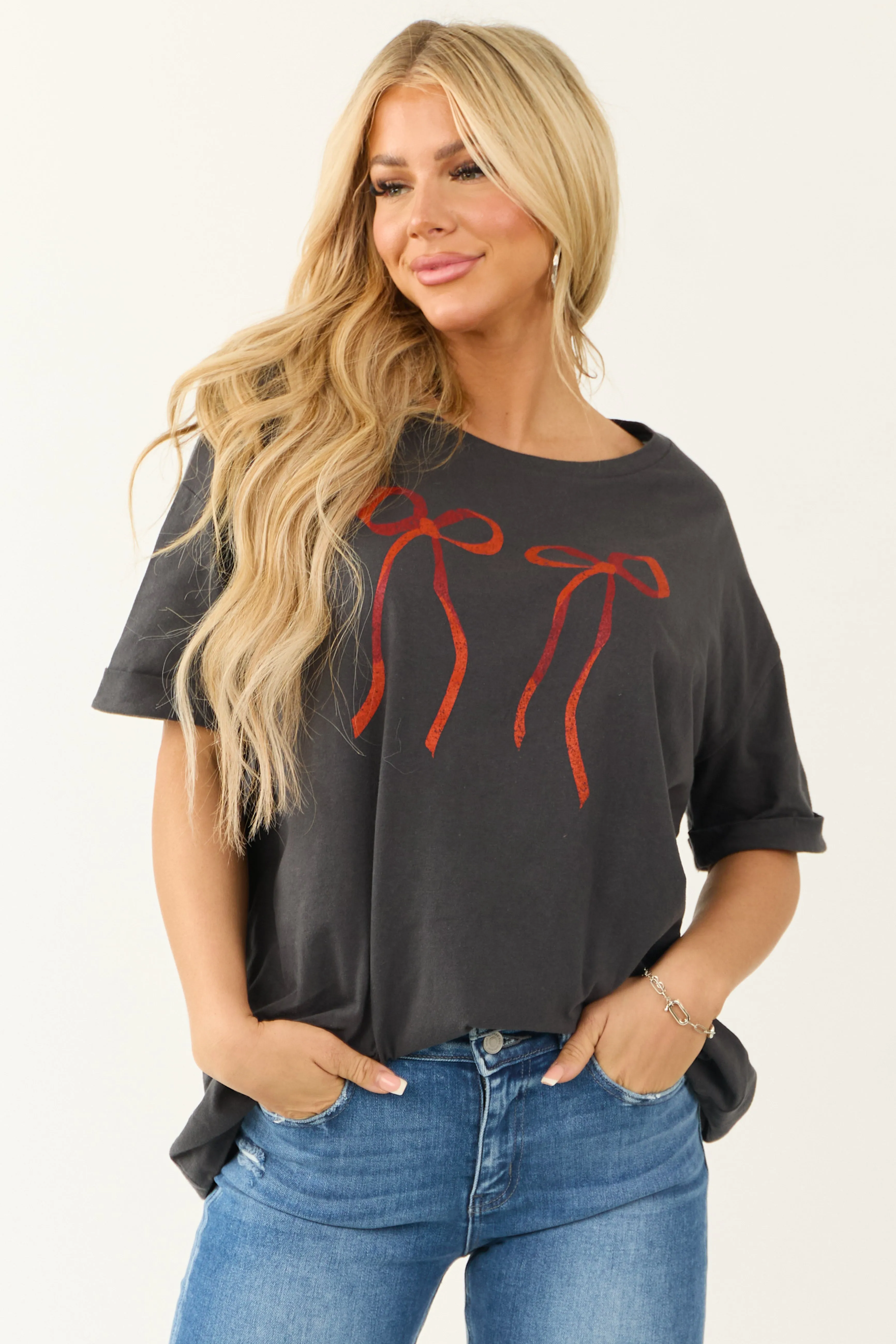 Graphite Bow Oversized Short Sleeve Graphic Top sold by Lime Lush