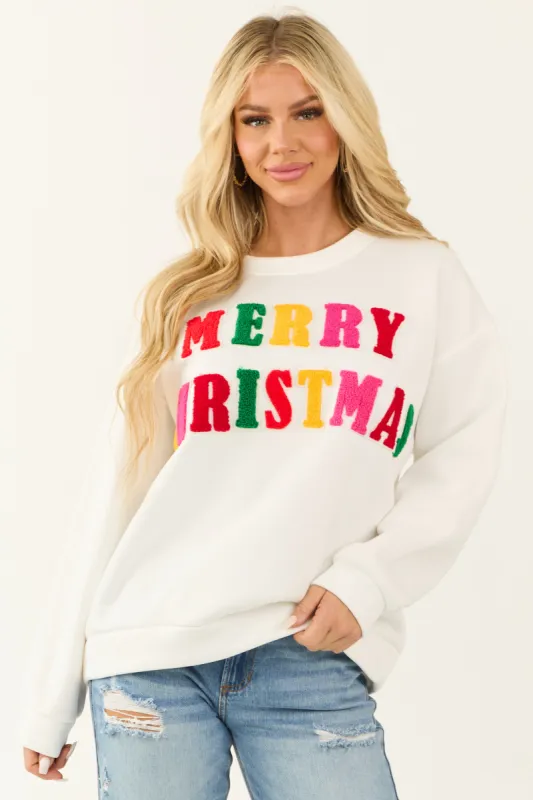 Ivory Merry Christmas Patch Detail Pullover sold by Lime Lush
