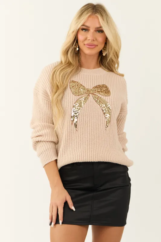 Desert Sand and Gold Sequin Bow Graphic Knit Sweater sold by Lime Lush