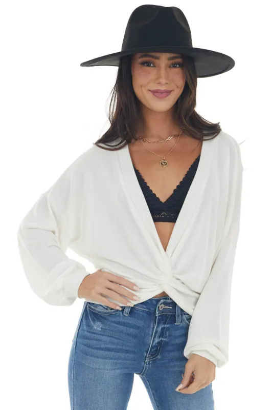 Ivory Deep V Neck Knit Top with Twist Detail sold by Lime Lush