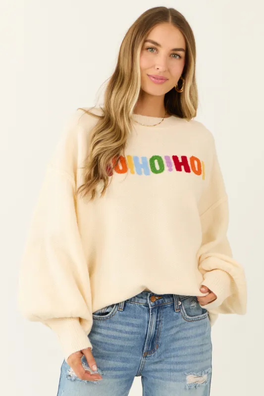 Cream HO HO HO Multicolor Graphic Knit Sweater sold by Lime Lush