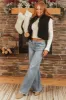 Black Sherpa Zip Up Collared Puffer Vest sold by Lime Lush