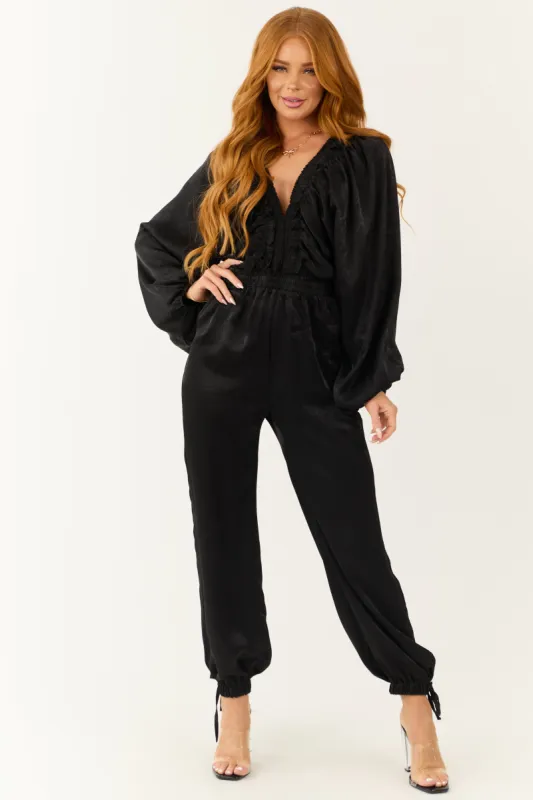 Black Textured Satin Deep V Neck Jumpsuit sold by Lime Lush