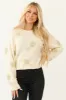 Cream Tinsel Champagne Graphic Knit Sweater sold by Lime Lush