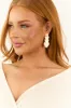 Gold Layered Textured Heart Drop Earrings sold by Lime Lush