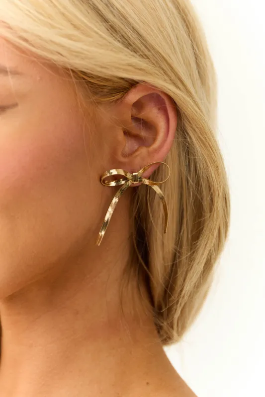 Gold Metallic Bow Earrings sold by Lime Lush