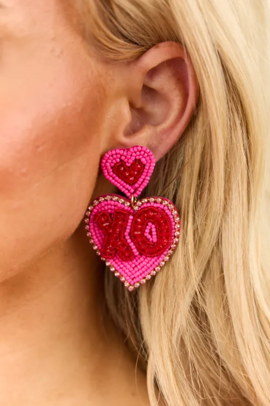 Fuchsia XO Heart Dangle Earrings sold by Lime Lush