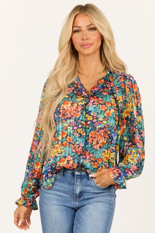 Teal Colorful Floral Lurex Frill V Neck Blouse made by Umgee