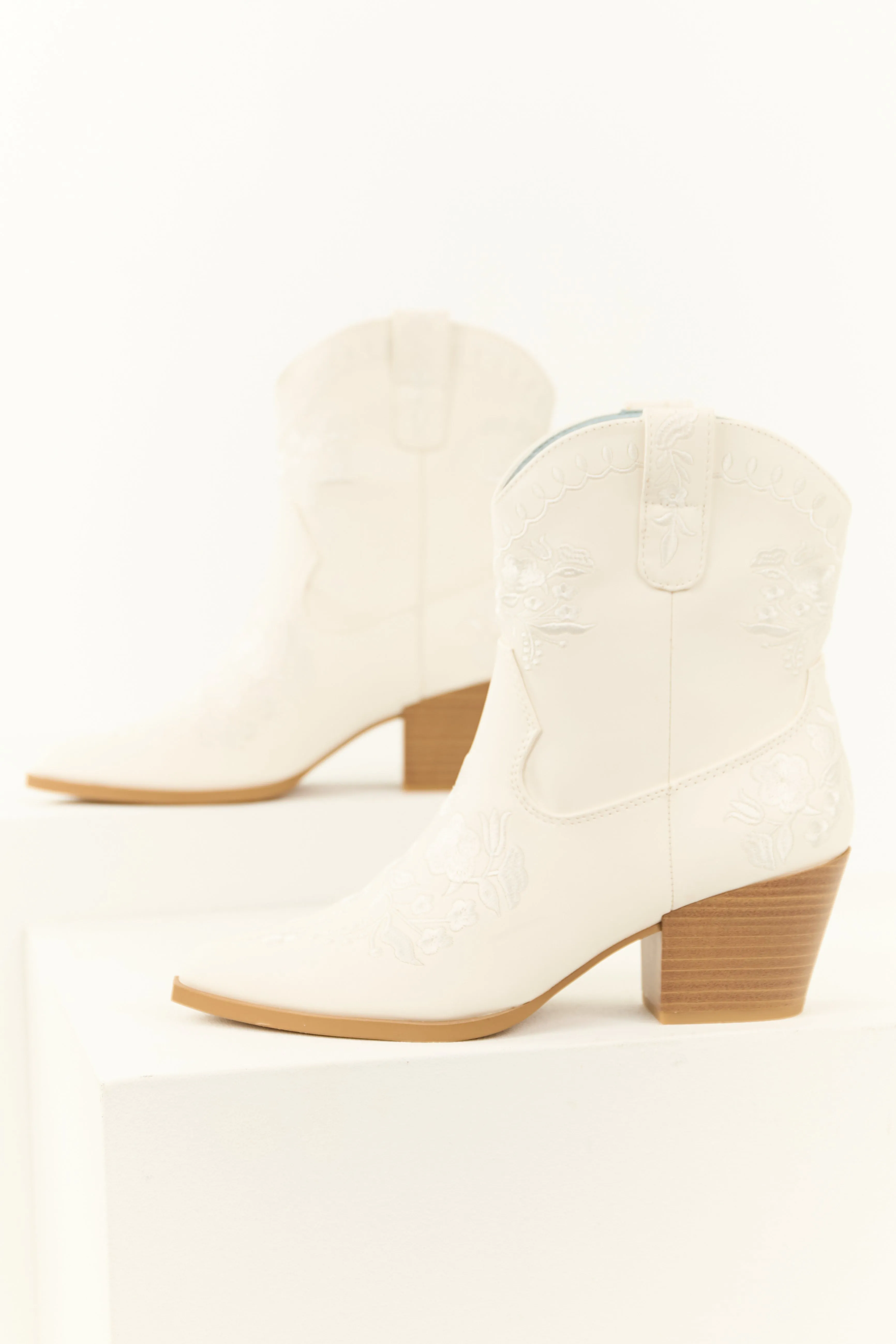White Floral Embroidered Stacked Heel Booties sold by Lime Lush