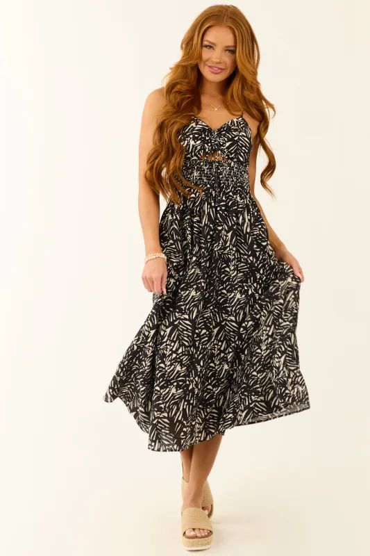 Black Abstract Leaf Print Ruched Midi Dress sold by Lime Lush