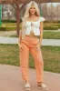 Risen Melon High Rise Cuffed Stretchy Barrel Jeans sold by Lime Lush