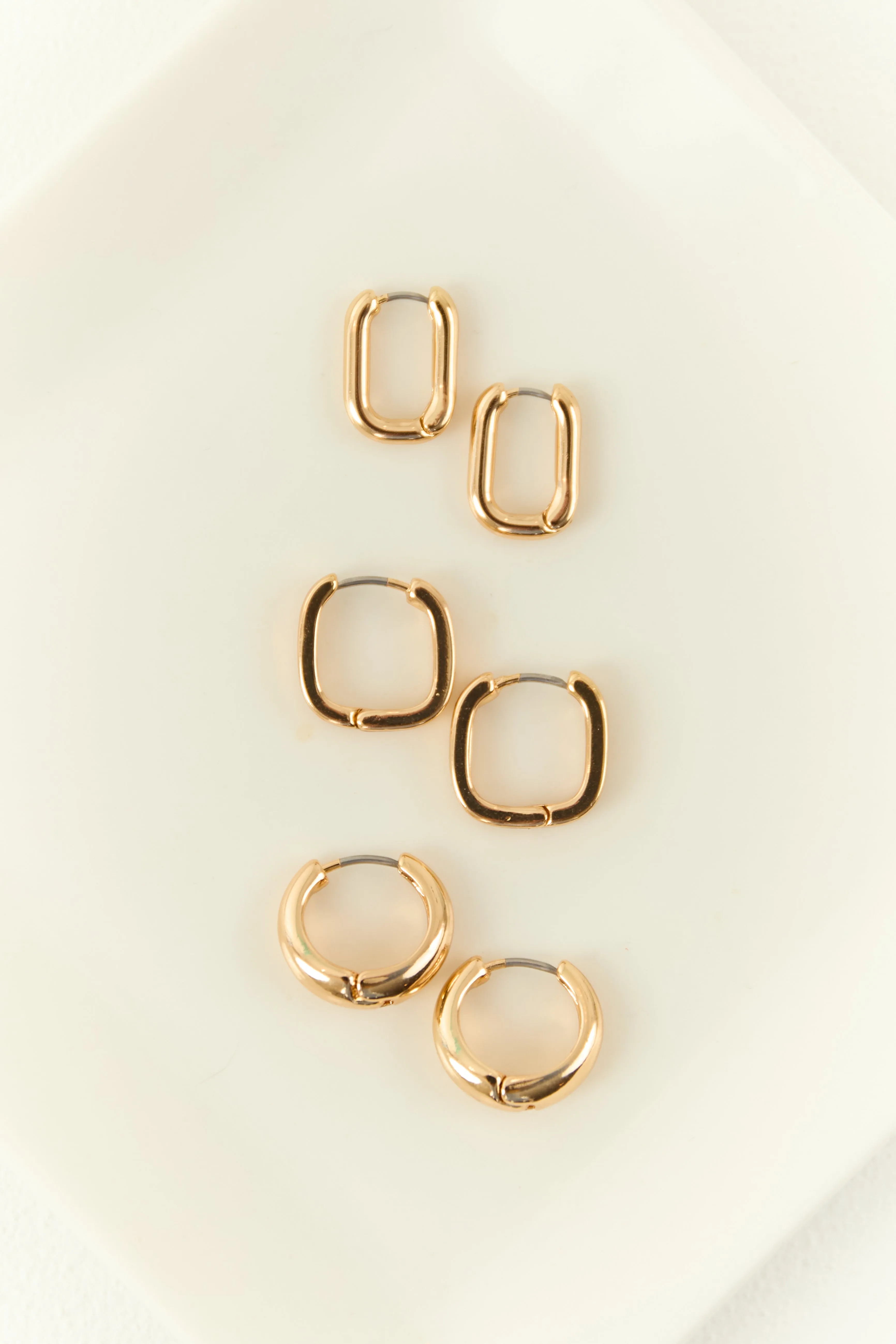 Gold 3 Pair Clicker Huggie Hoop Earring Set sold by Lime Lush