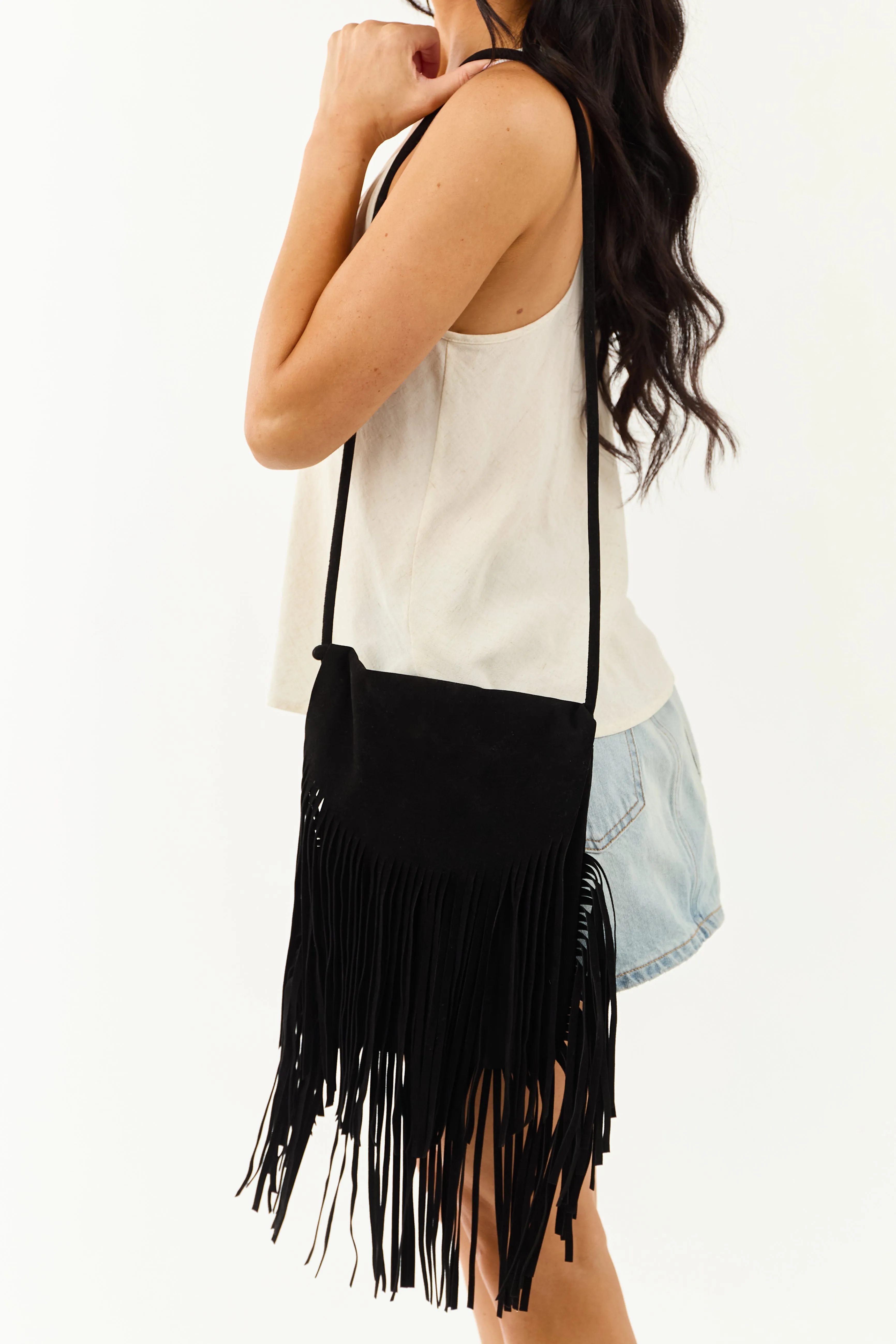 Black Faux Suede Fringe Crossbody Bag sold by Lime Lush