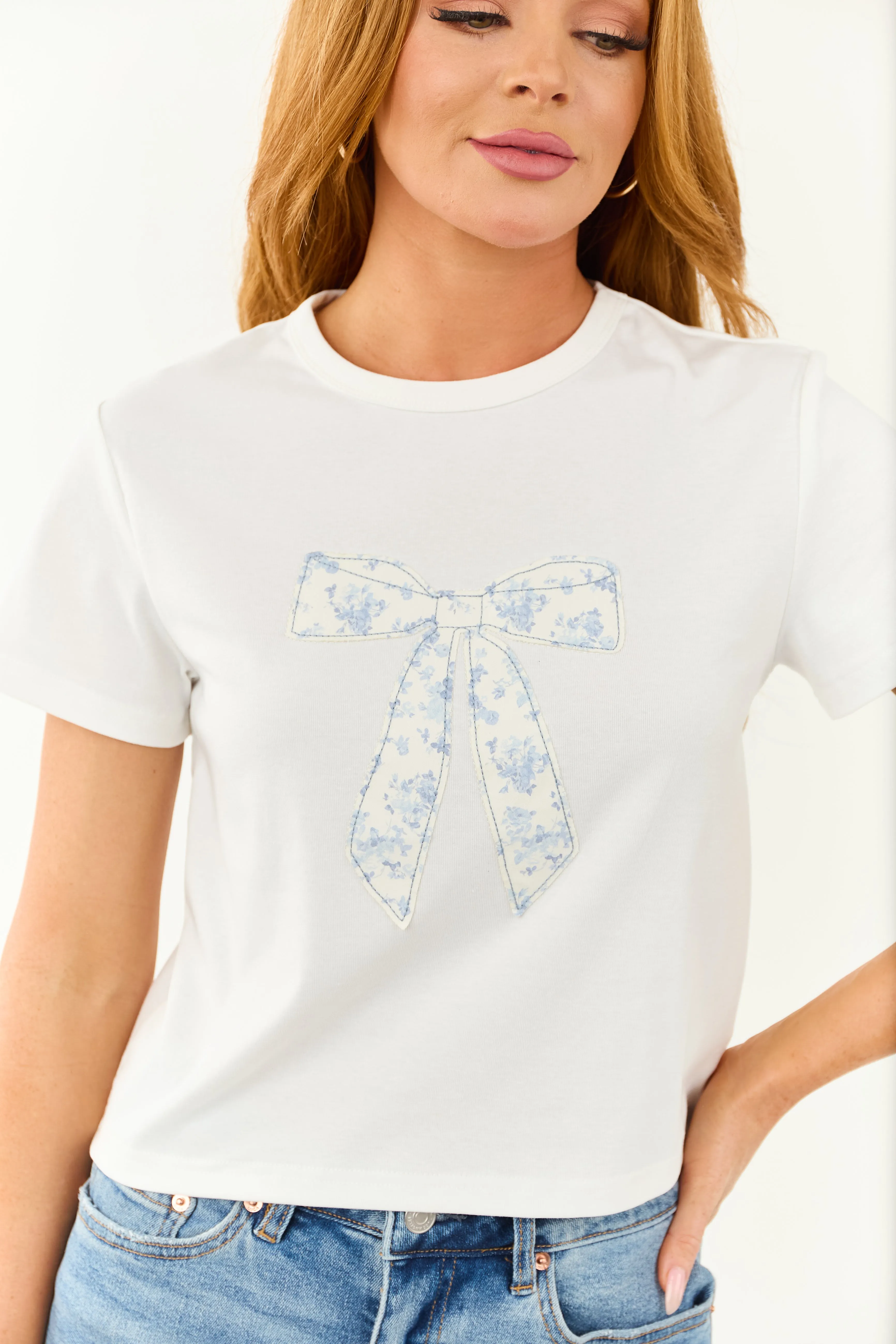 Off White Bow Patch Graphic Short Sleeve Top sold by Lime Lush
