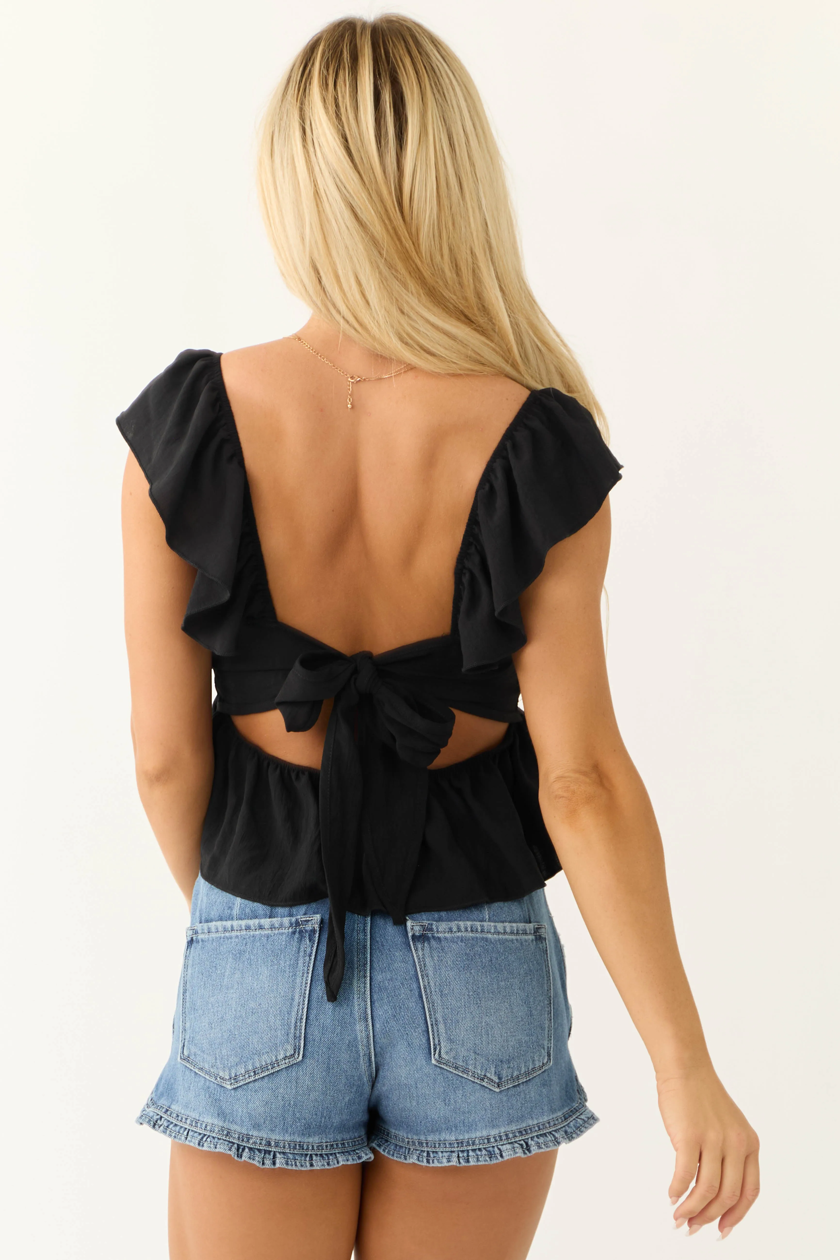 Black Flutter Sleeve Tie Back Peplum Blouse sold by Lime Lush product image thumbnail 5
