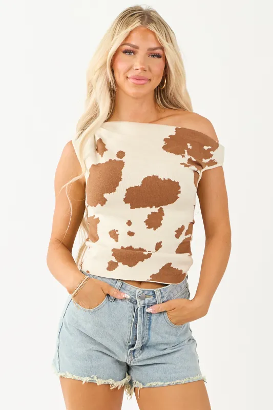 Cream Cow Print Asymmetrical One Shoulder Top sold by Lime Lush