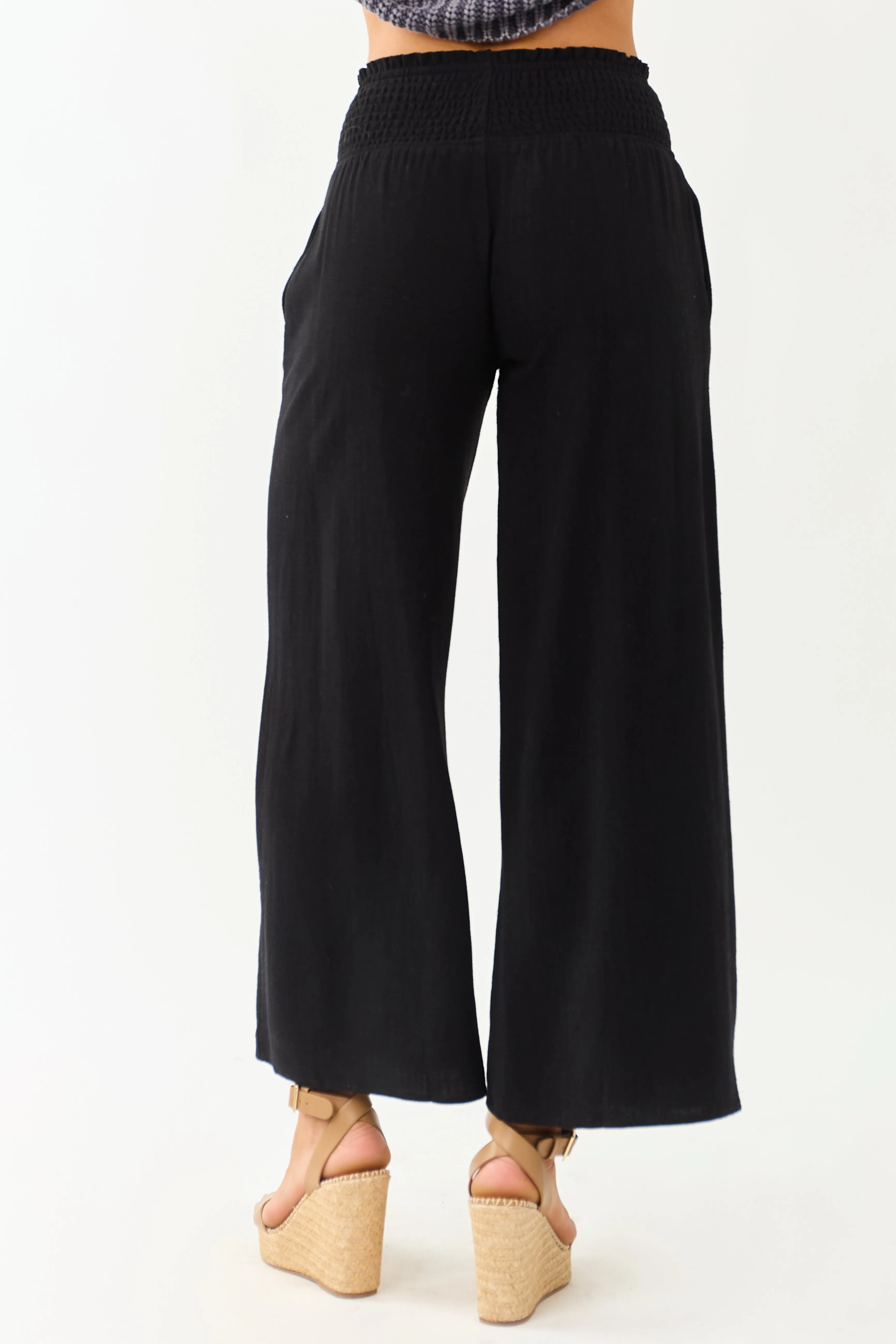 Black Smocked Waist Flowy Wide Leg Pants sold by Lime Lush product image thumbnail 4