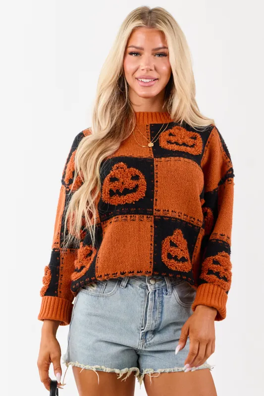 Lovelo Pumpkin Checkered Jack-O-Lantern Sweater sold by Lime Lush