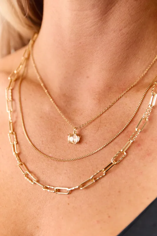 Gold Layered Rhinestone Necklace and Earrings Set sold by Lime Lush