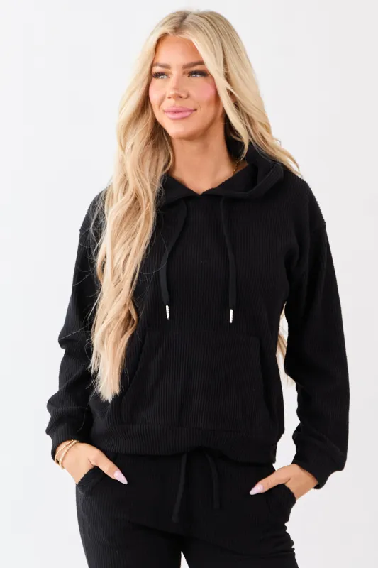 Black Rib Knit Drawstring Hooded Sweatshirt sold by Lime Lush