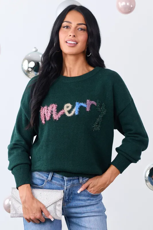 Forest Green 'Merry' Tinsel 3D Lettering Sweater sold by Lime Lush