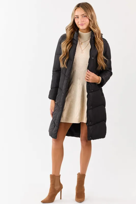 Black Hooded Puffer Duster Coat with Belt sold by Lime Lush
