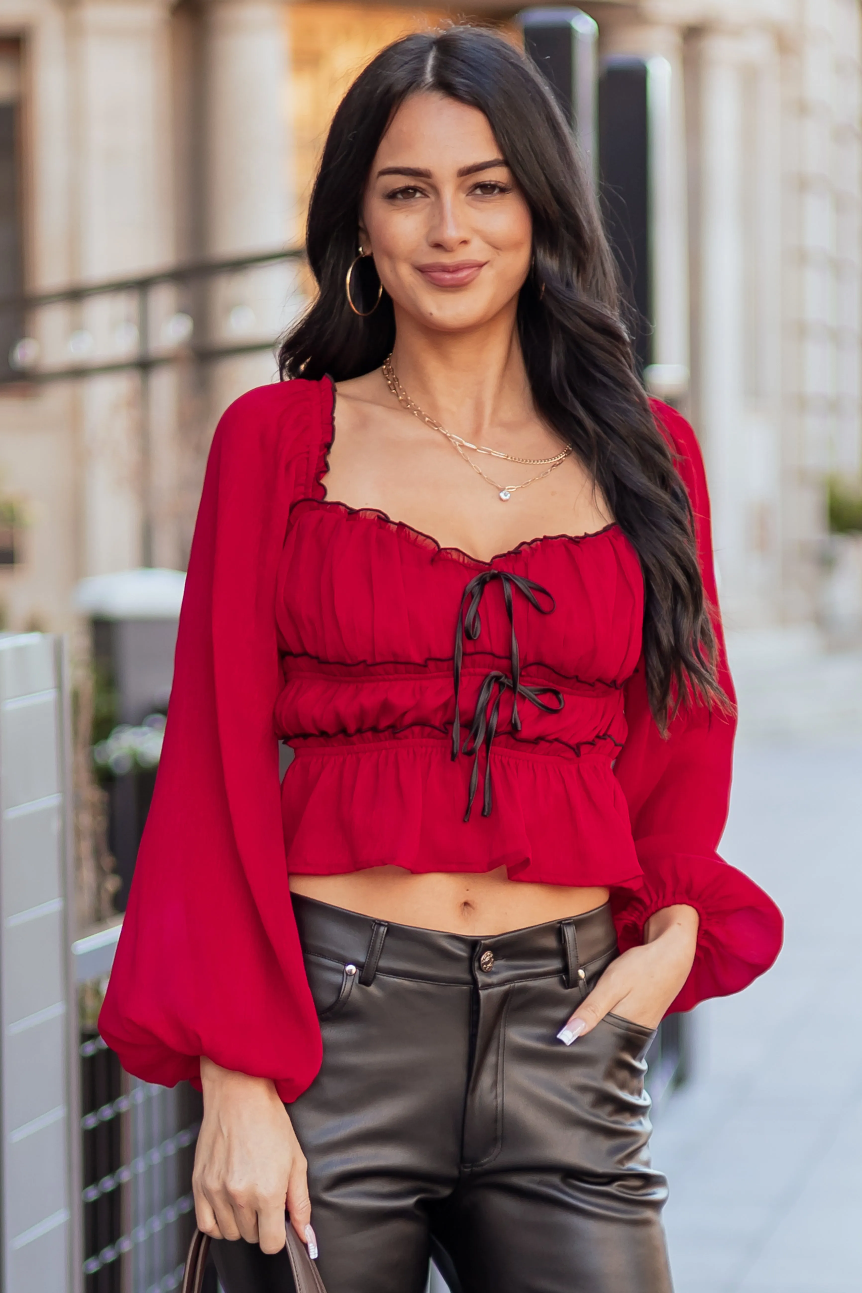 Ruby Tiered Bow Detail Lettuce Trim Long Sleeve Top sold by Lime Lush