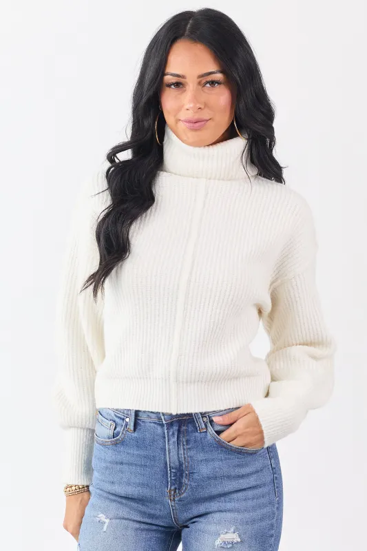 Ivory Turtleneck Bubble Sleeve Rib Knit Sweater sold by Lime Lush