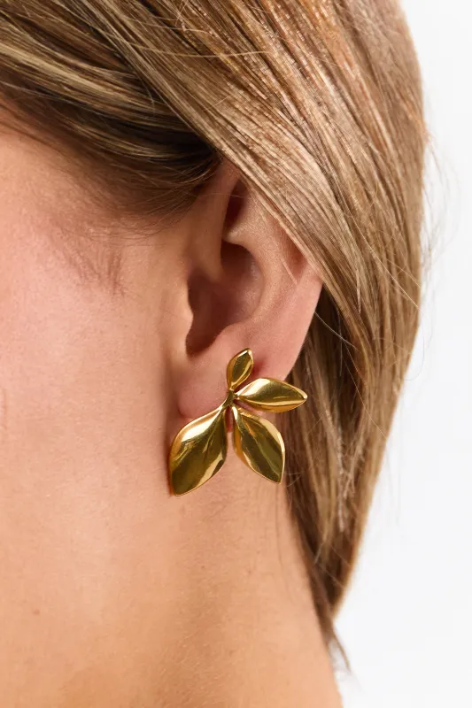 Gold Metallic Asymmetrical Leaf Stud Earrings sold by Lime Lush