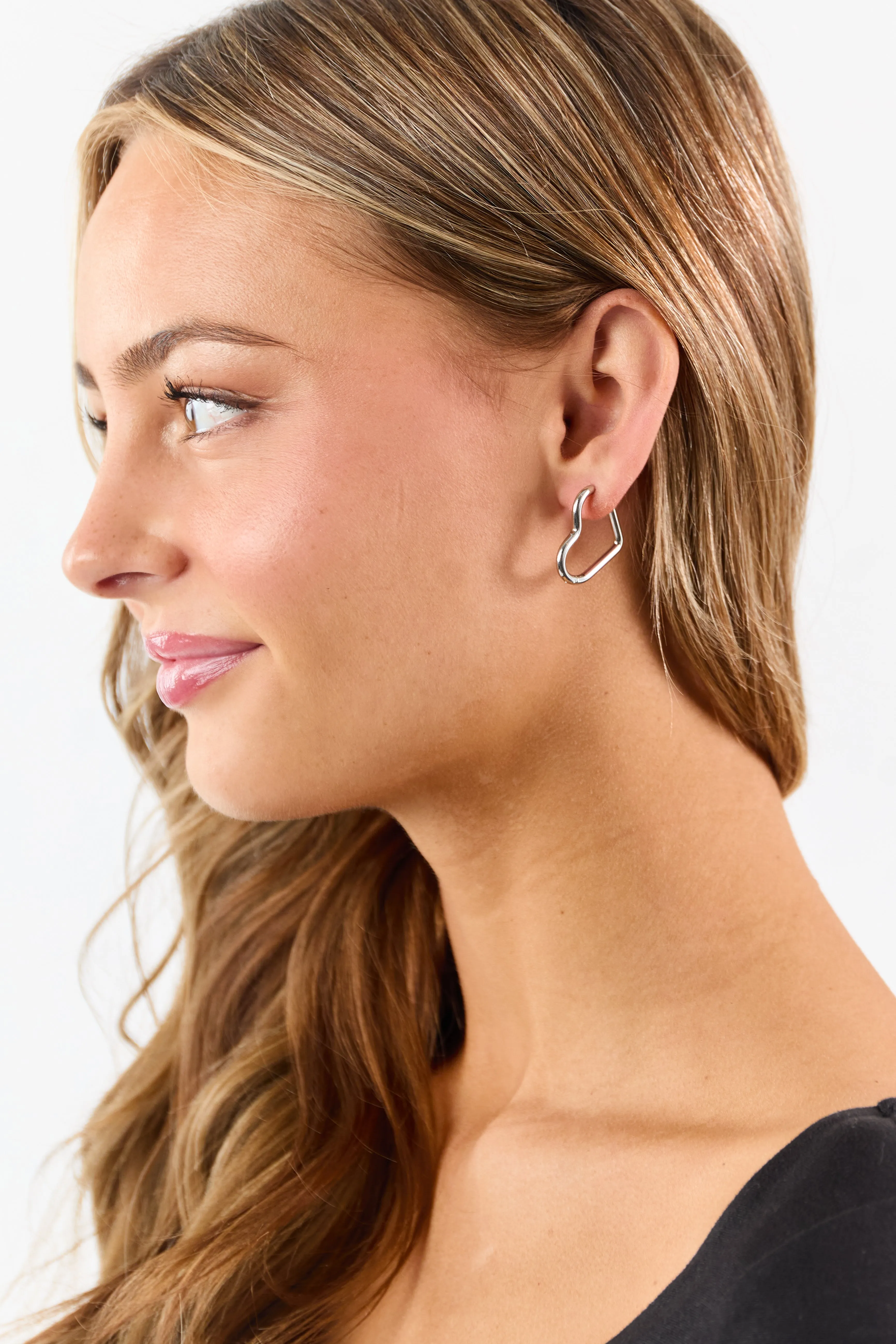 Silver Stainless Steel Huggie Heart Earrings sold by Lime Lush product image thumbnail 2