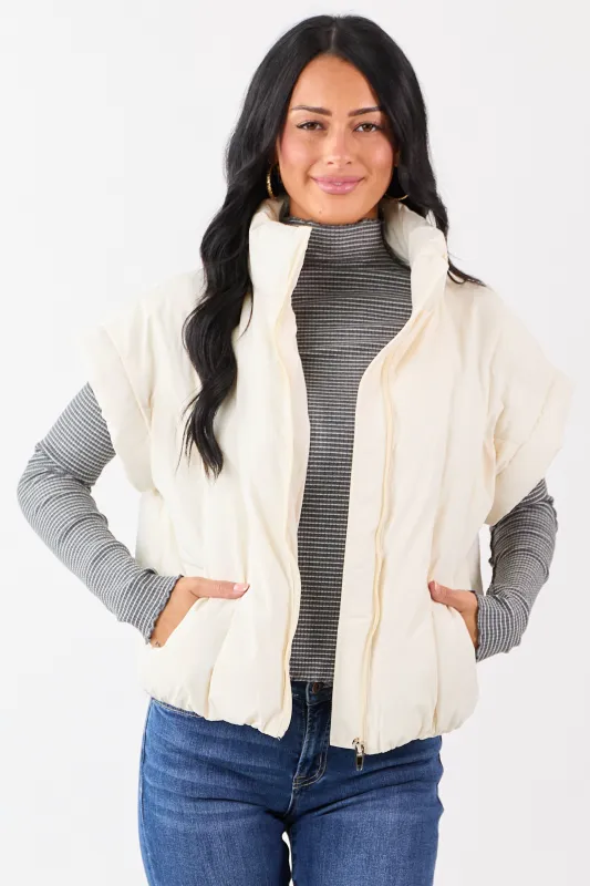 Vanilla Mock Neck Zip Up Quilted Puffer Vest sold by Lime Lush