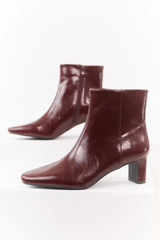 Sangria Faux Leather Pointed Toe Booties sold by Lime Lush