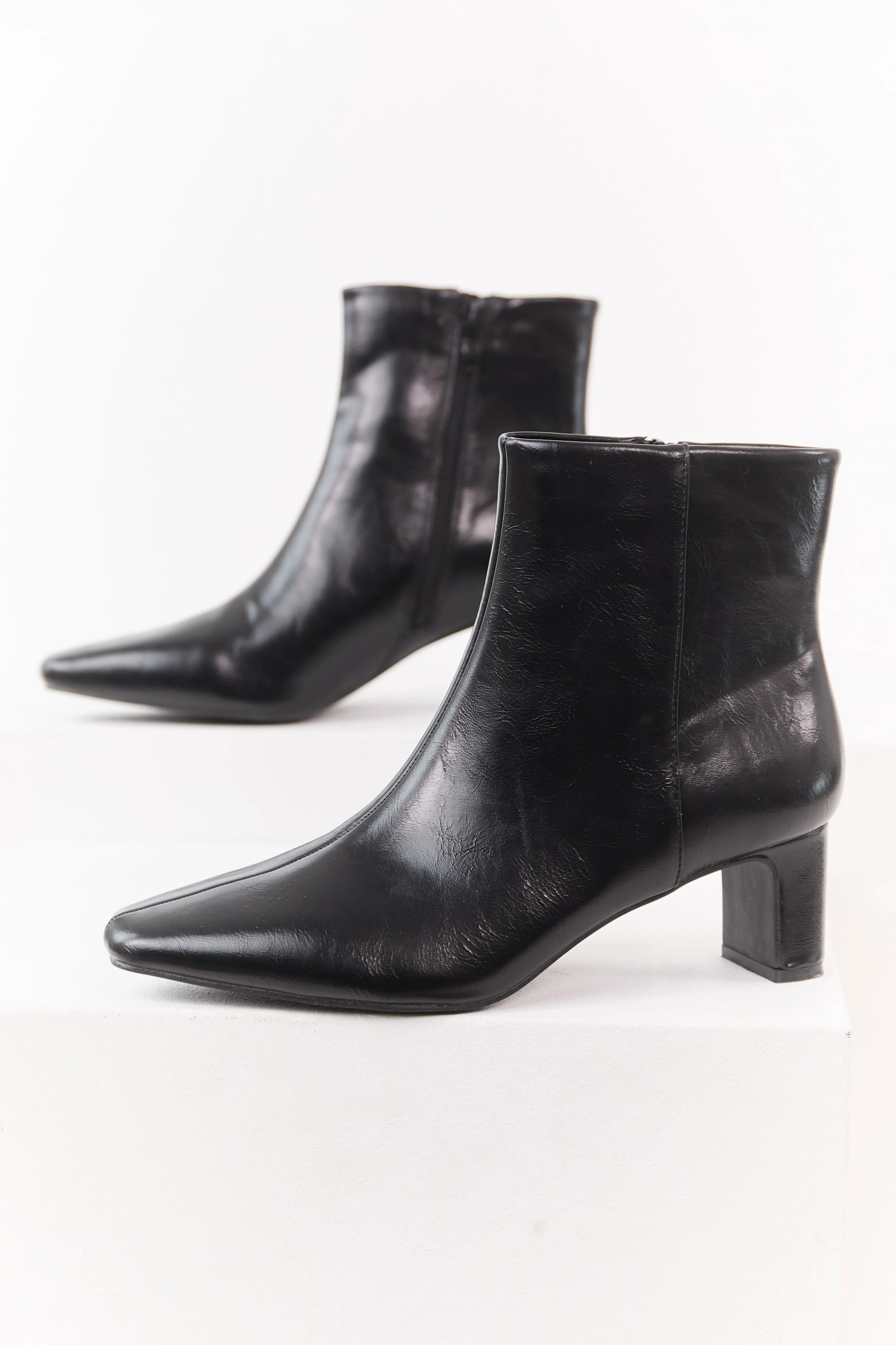 Black Faux Leather Pointed Toe Booties sold by Lime Lush