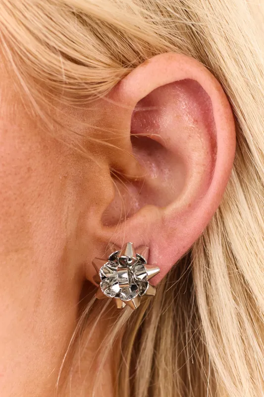 Silver Holiday Bow Stud Earrings sold by Lime Lush