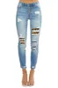 KanCan Light Wash High Rise Boyfriend Jeans with Leopard Patches sold by Lime Lush