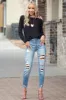 KanCan Light Wash High Rise Boyfriend Jeans with Leopard Patches sold by Lime Lush