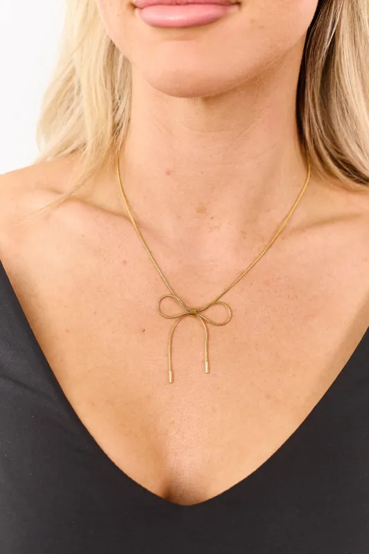 Gold Metallic Bow Detail Snake Chain Necklace sold by Lime Lush
