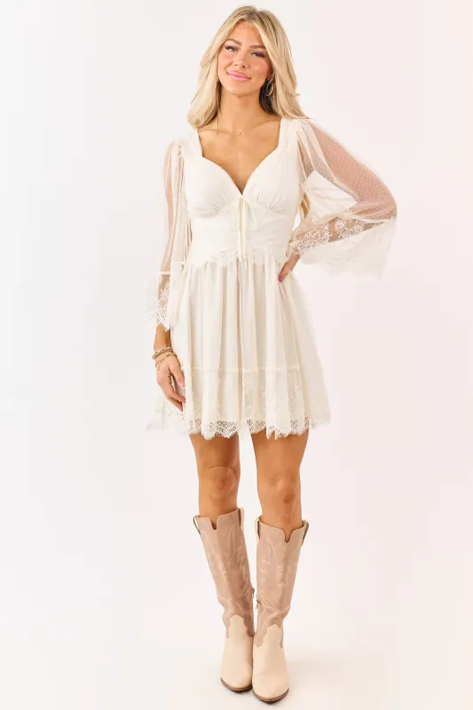 Cream Dotted Lace Open Back Long Sleeve Mini Dress sold by Lime Lush
