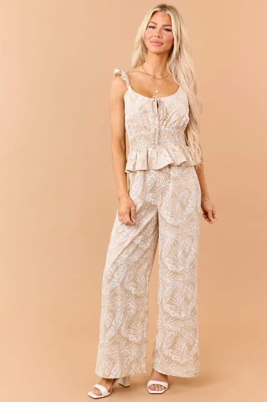 Desert Leaf Print Smocked Peplum Waist Jumpsuit made by Doe & Rae