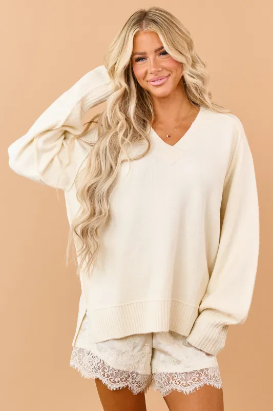 Cream Soft Knit Ribbed Trim V-Neck Relaxed Sweater made by Rae Mode