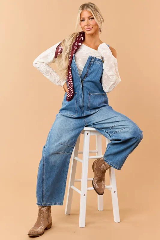 Listicle Medium Wash Denim Relaxed Barrel Overalls made by Listicle