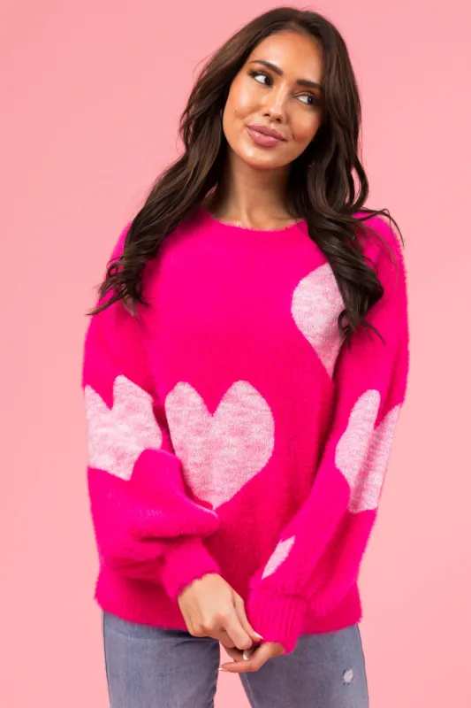 Magenta Heart Pattern Fuzzy Knit Sweater sold by Lime Lush