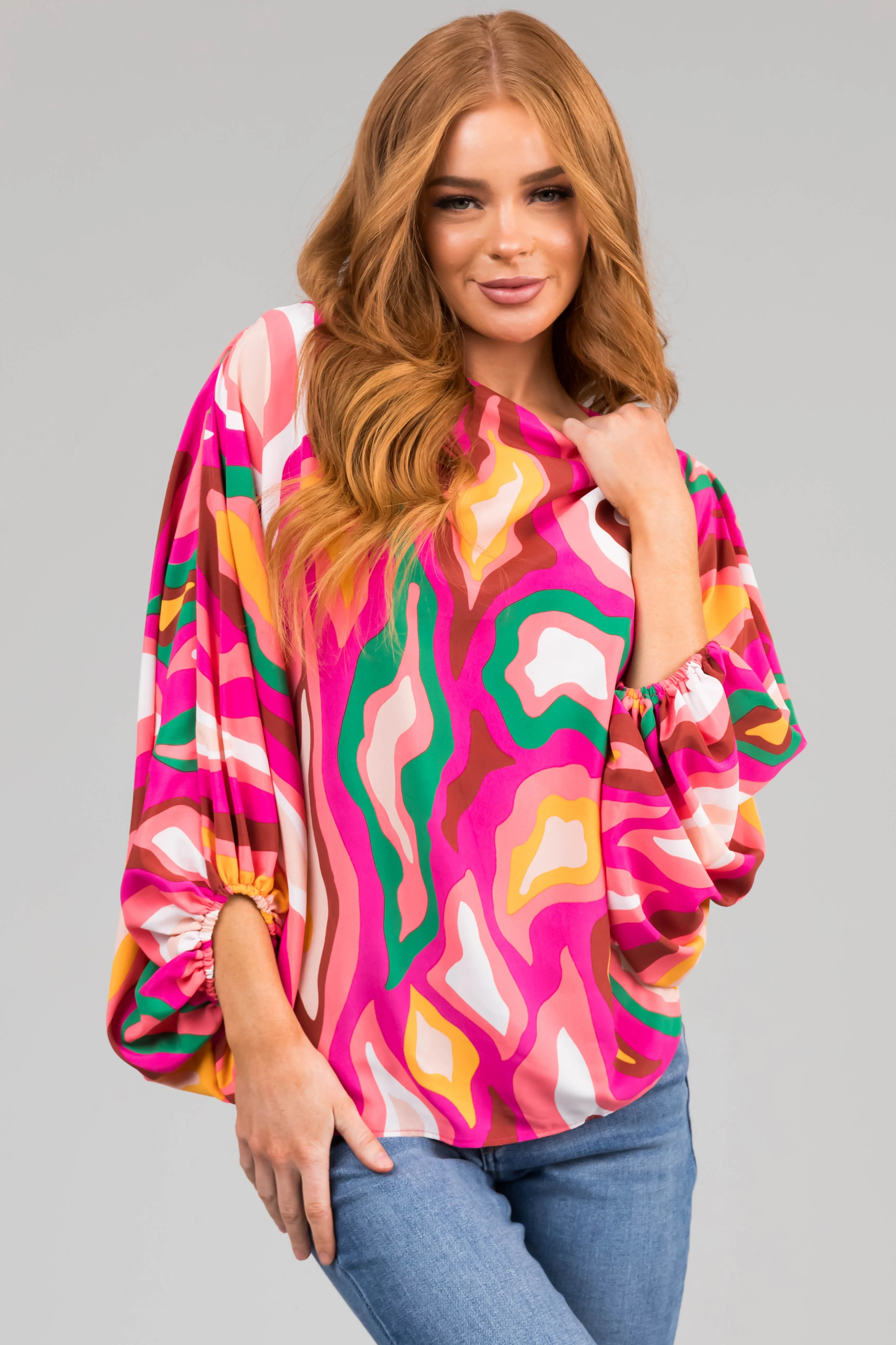 Fuchsia Multicolor Abstract Dolman Sleeve Blouse sold by Lime Lush